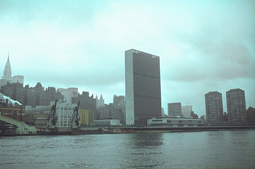 New York City, NY, USA, 1968. The UN Building in East Midtown Manhattan on the edge of the East River on a hazy day.