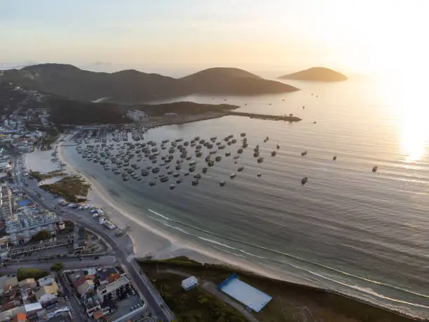 Wonderful coast of the Atlantic Ocean in the midst of nature, mountains, forests and a small coastal town. Drone aerial view. Arraial do Cabo, Rio de Janeiro, Brazil