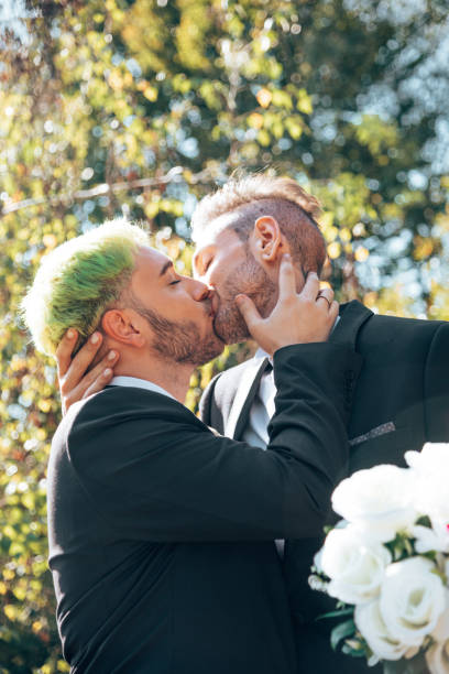 istock gay lovers kissing each other 1407394671