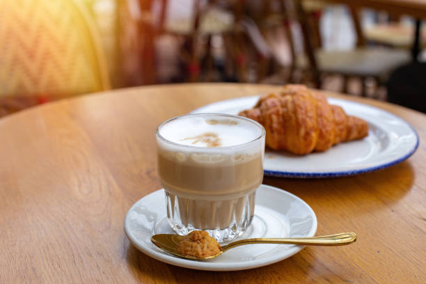 istock Coffee latte and chocolate croissant 1407400334
