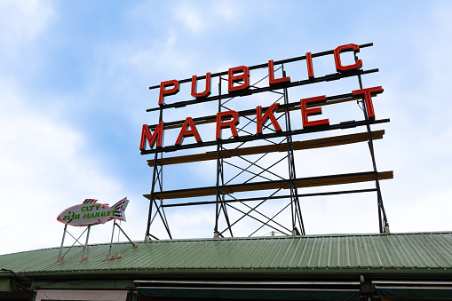 Shot on 6-18-2022 in Seattle Washington, USA. Photo of Sign on roof of building.