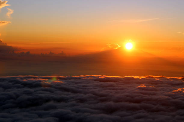 istock Sunrise among the sea of clouds 1407410527