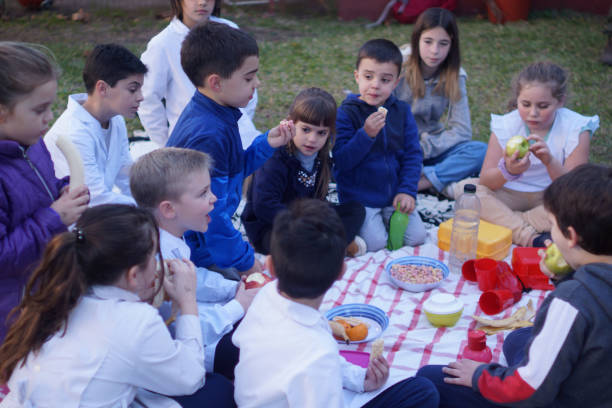 istock children eating fruit in the schoolyard 1407414487