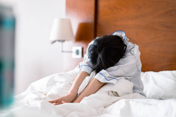 istock Young woman suffering from hangover 1407416956