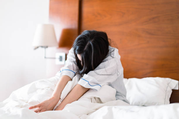 istock Young woman suffering from hangover 1407416960