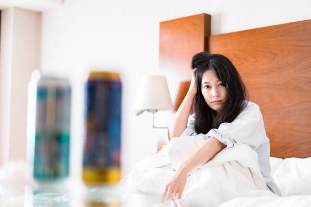 istock Young woman suffering from hangover 1407416965