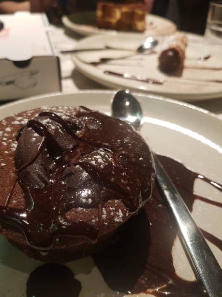 istock Birthday celebration with a small chocolate lava cake 1407426499