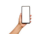 Hand holding mobile phone with blank screen on white background. Isolated.