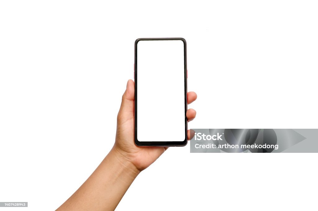 Hand holding mobile phone with blank screen on white background. Isolated. Human Hand Stock Photo