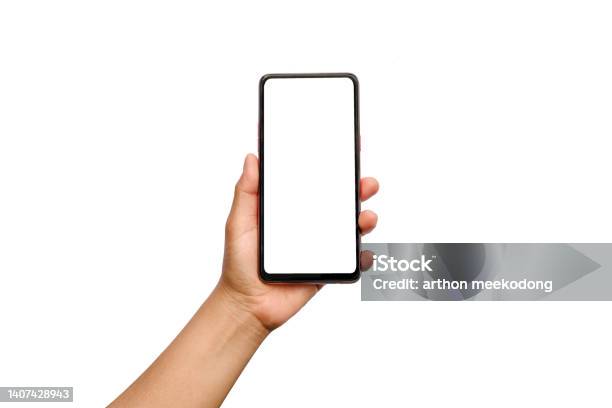 Hand Holding Mobile Phone With Blank Screen On White Background Isolated Stock Photo - Download Image Now