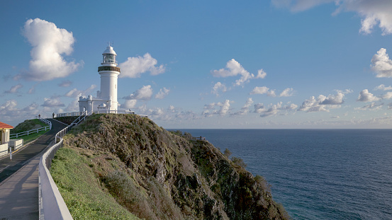 a spring morning shot of a sunlit byron bay lighthouse in northern nsw, australia
