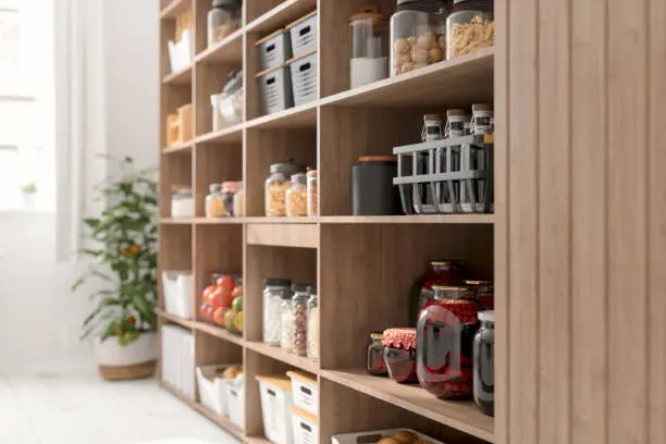 Photo of Close-up View Of Organised Pantry Items With Variety of Nonperishable Food Staples And Preserved Foods in Jars On Kitchen Shelf