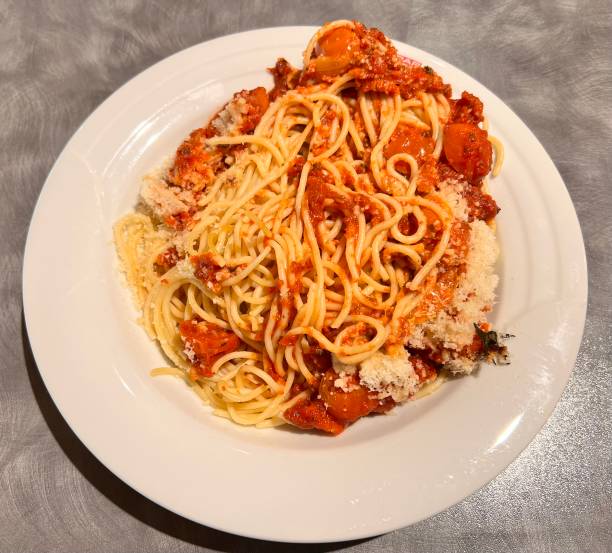 istock Dinner Lunch - Spaghetti Bolognese Sugo Parmesan Tomato Sauce 1407447038