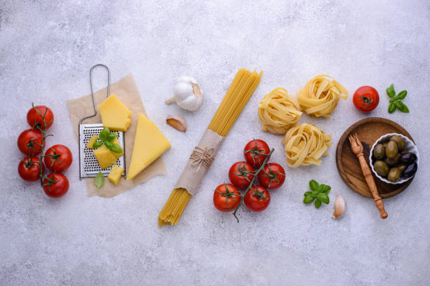 istock Italian food cooking background with pasta 1407449663