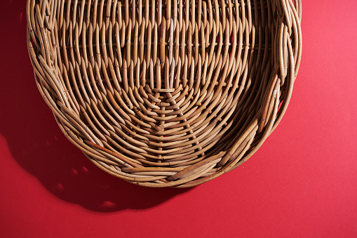 Wicker basket isolated on white background.