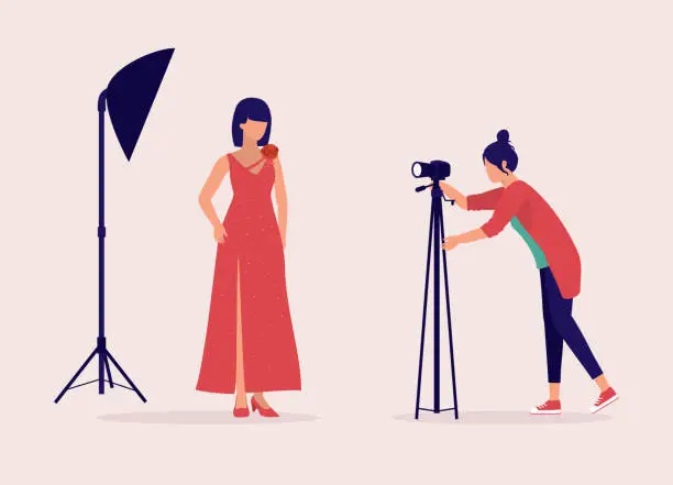 Vector illustration of Young Woman Fashion Photographer Taking Photograph Of Female Model.