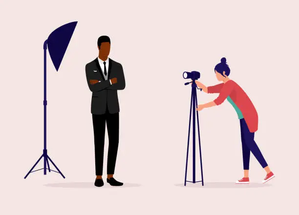 Vector illustration of Young Woman Fashion Photographer Taking Photograph Of A Black Male Model.