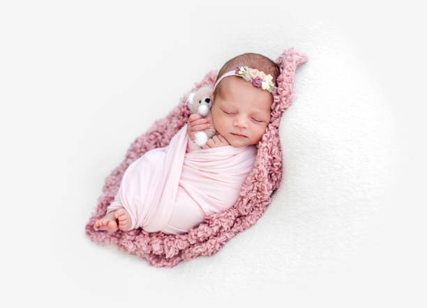 istock Sleeping newborn baby girl 1407451879