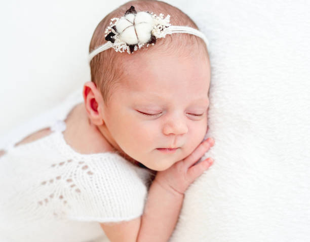istock Sleeping newborn baby girl 1407451880