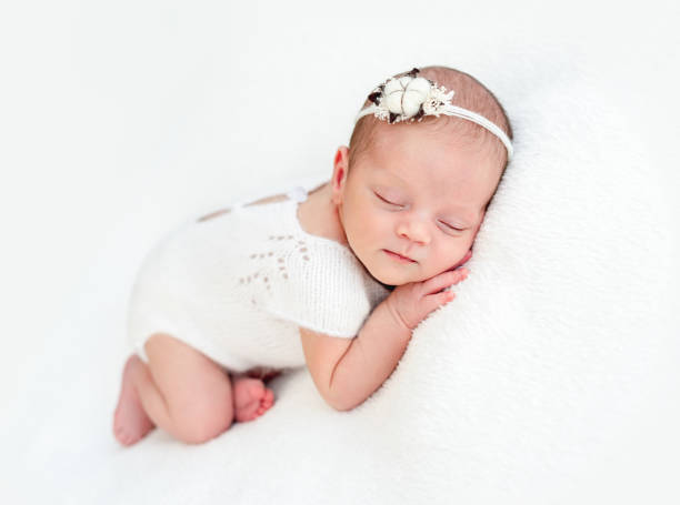 istock Sleeping newborn baby girl 1407451881