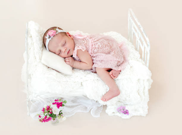 istock Sleeping newborn baby girl 1407451884