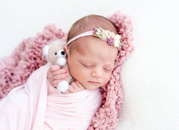 istock Sleeping newborn baby girl 1407451894
