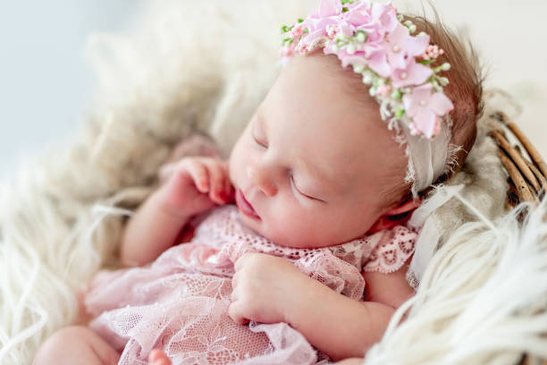 istock Sleeping newborn baby girl 1407452135
