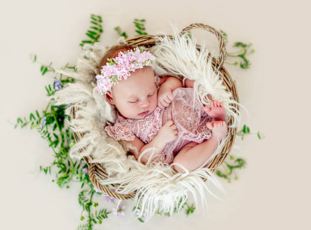 istock Sleeping newborn baby girl 1407452139