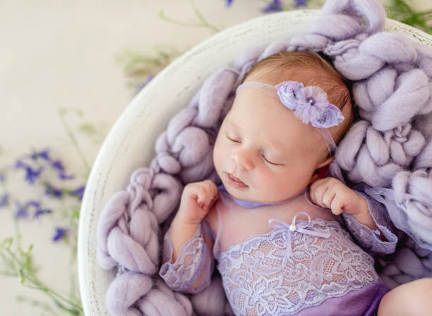 istock Sleeping newborn baby girl 1407452151
