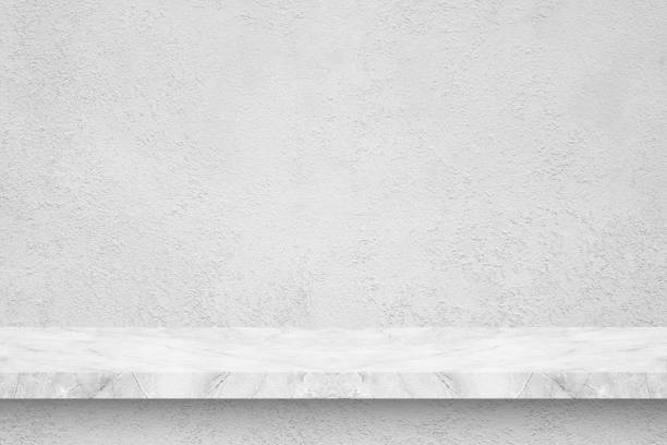 istock light grey perspective marble shelf on grey grunge concrete wall 1407454858