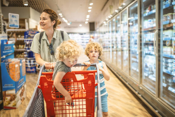 istock Mum and boys in a supermarket 1407457784