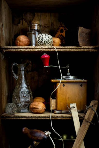 istock Vintage kitchen cabinet with appliances, utensils, jars and coffee grinder 1407457946