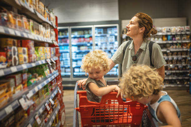 istock Mum and boys in a supermarket 1407458771