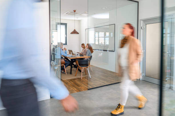 istock Busy Office With Business Coworkers Working 1407458825