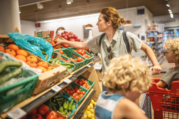 istock Mother and her boys in a supermarket 1407458917