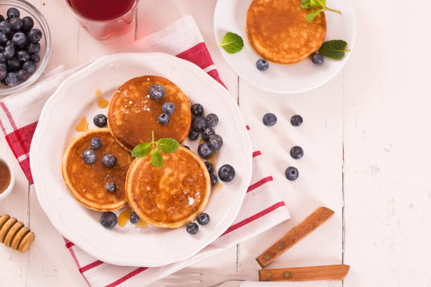 istock Pancakes with blueberries and chocolate cream. 1407459374
