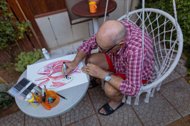 istock Excited senior creating an art poster for lung cancer awareness 1407461908