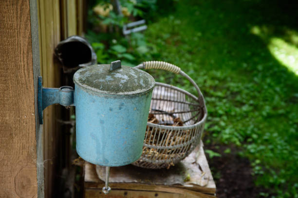 a blue hand-washing water gurgle against the boarded wall