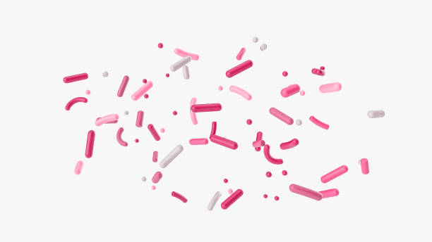 istock Pink and white sprinkles colored on light background 3d illustration 1407468623