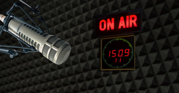 istock Professional microphone and on air sign 1407469176