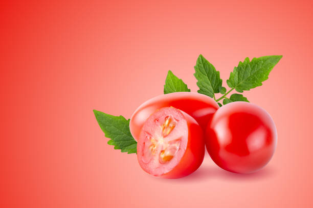 istock Red ripe tomatoes isolated on red background 1407470476