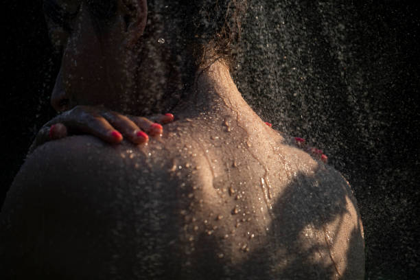 istock Woman showering outdoor 1407471432