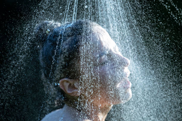 istock Woman showering outdoor 1407471477