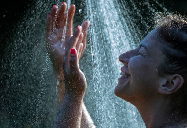istock Woman showering outdoor 1407471539