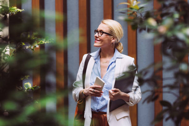 istock Happy Business Woman Taking A Break At Work 1407471956