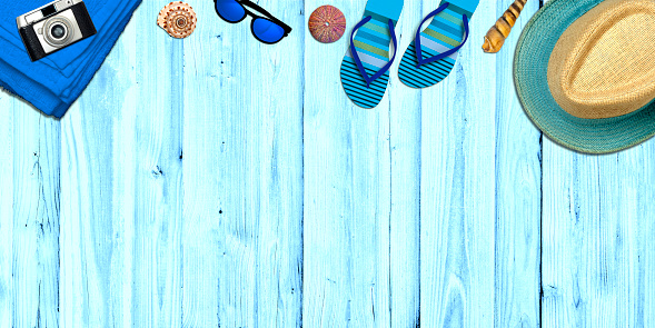 Topview Beach Accessories Background on Blue Wood