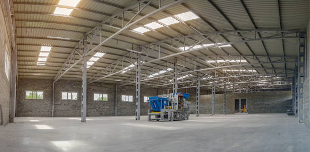 istock Paving machine. Empty shop for the production of cobblestones. Panoramic view. 1407472084