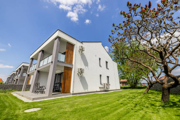 istock Residential area, modern apartment buildings over cloudscape 1407473616