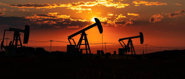 istock Oil pumps at the horizon. 1407473817