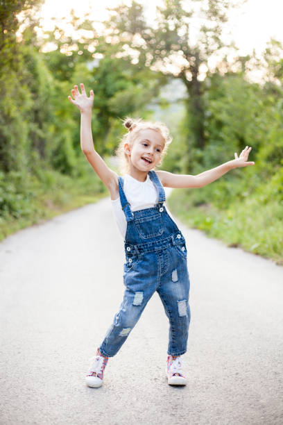 istock cute happy girl 1407474126